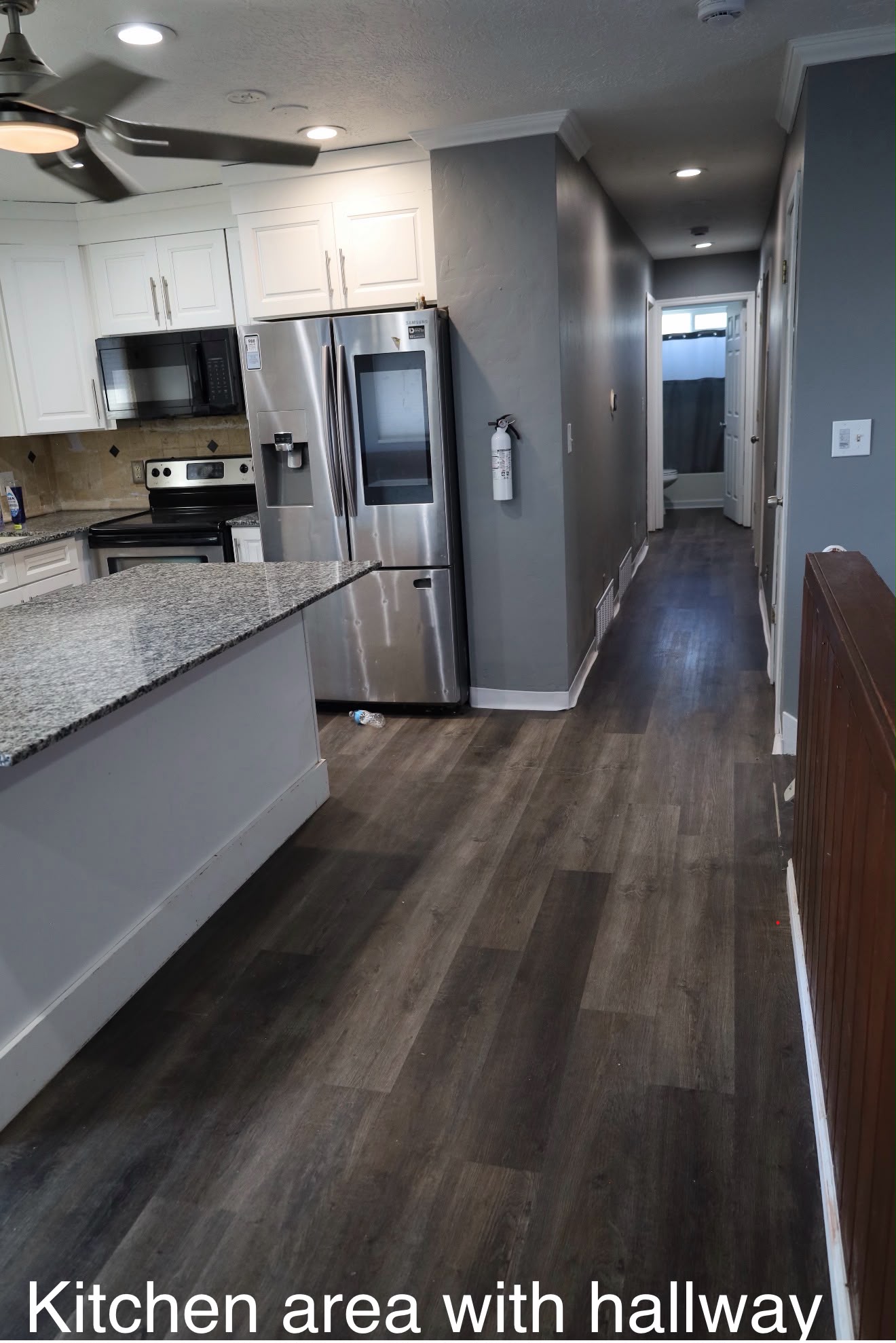 Kitchen area with hallway view